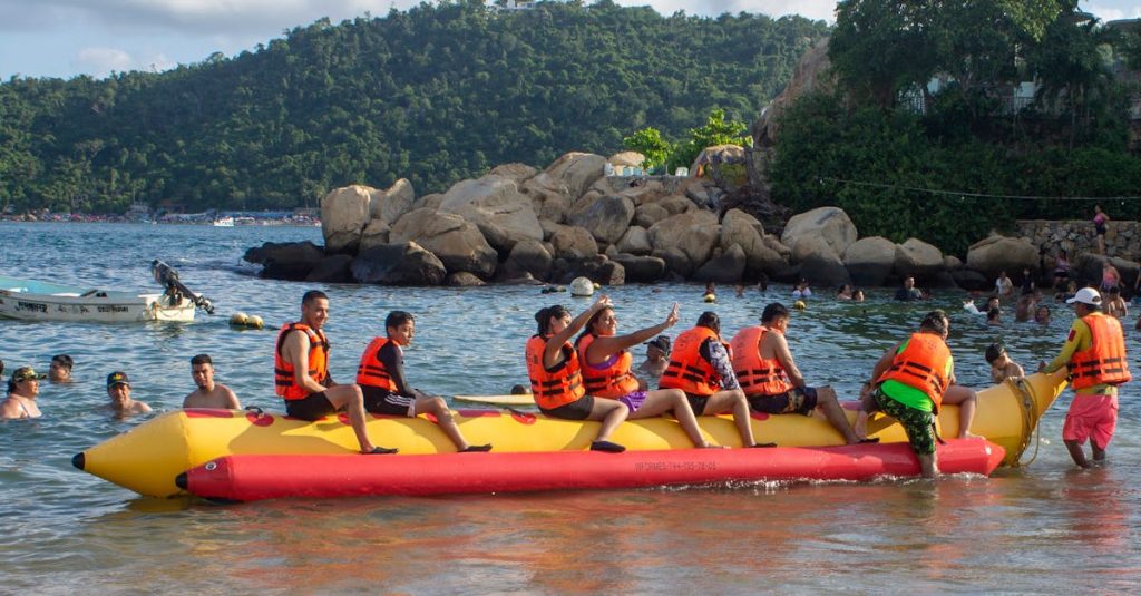 Group enjoying a thrilling banana boat ride at Acapulco beach under the sun.
